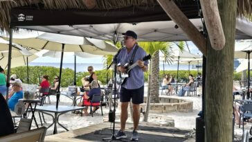 archer at fishermen's village sunset beach club