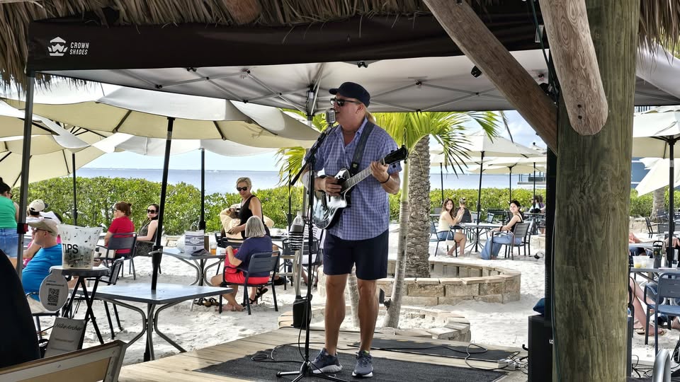 archer at fishermen's village sunset beach club